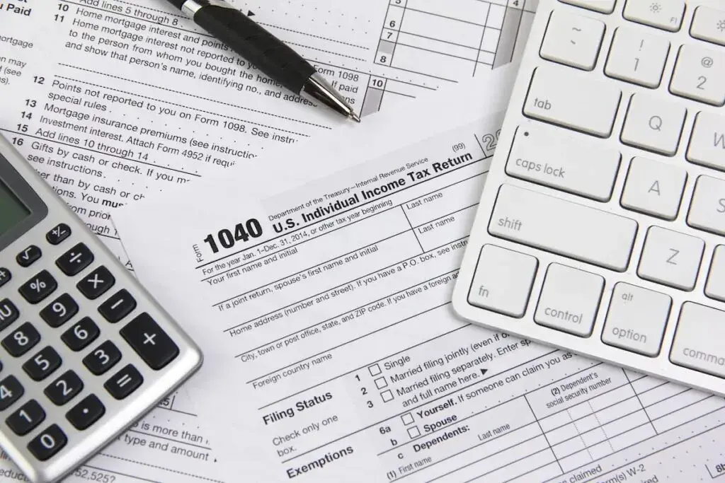 1040-tax-form-a-calculator-and-a-pen-1024x683.jpeg