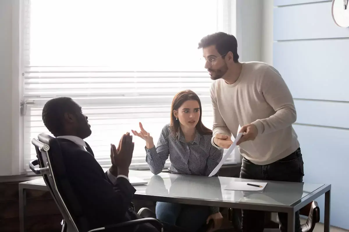 angry-man-pointing-to-a-contract.jpeg