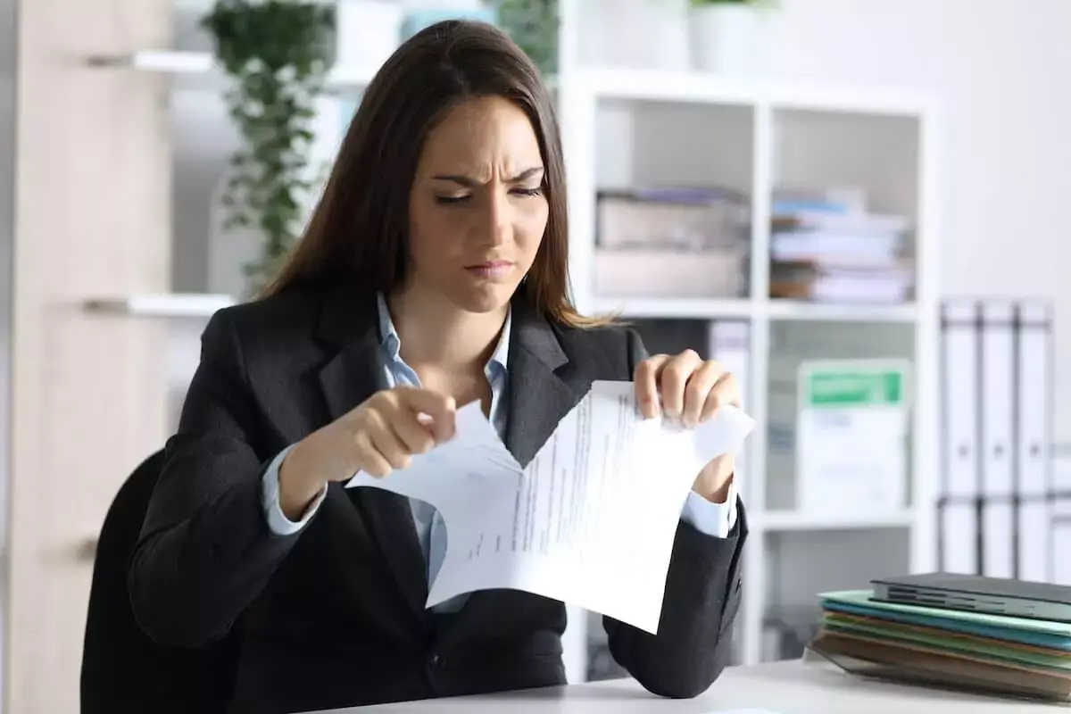 anrgy-executive-tearing-up-a-contract.jpeg