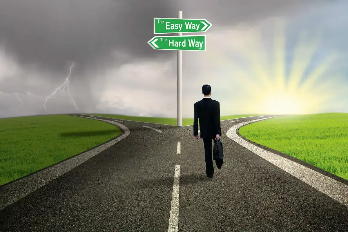 businessman-walking-towards-a-fork-in-the-road.jpg
