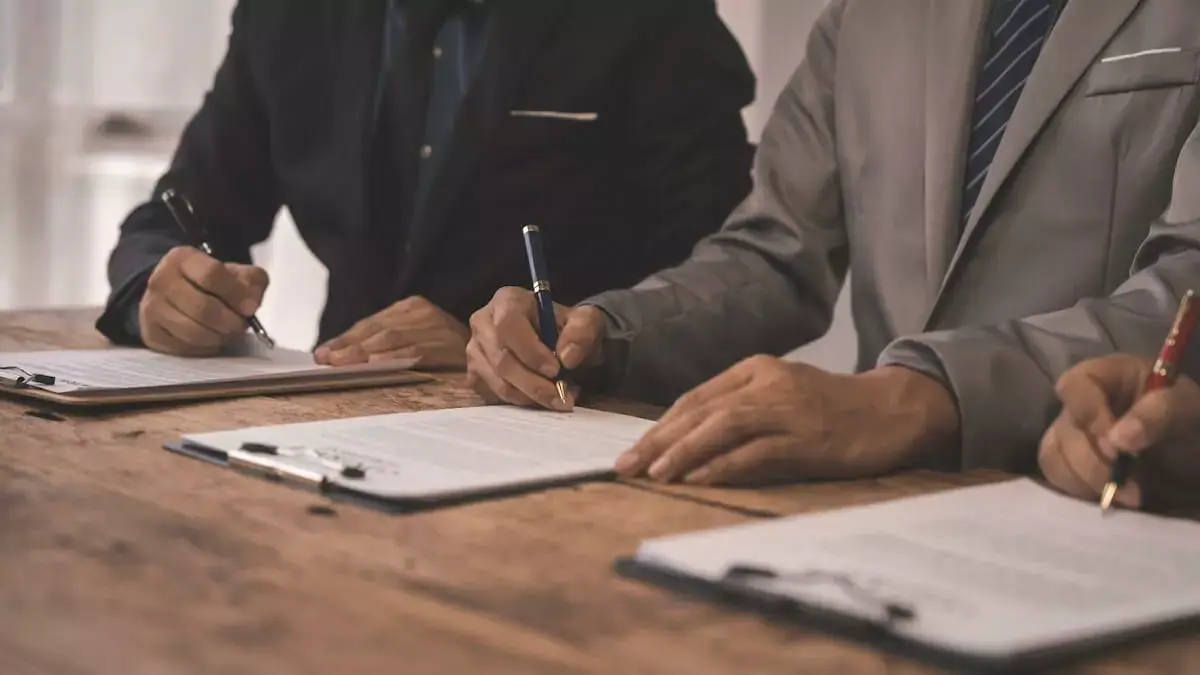clients-signing-contracts.jpg