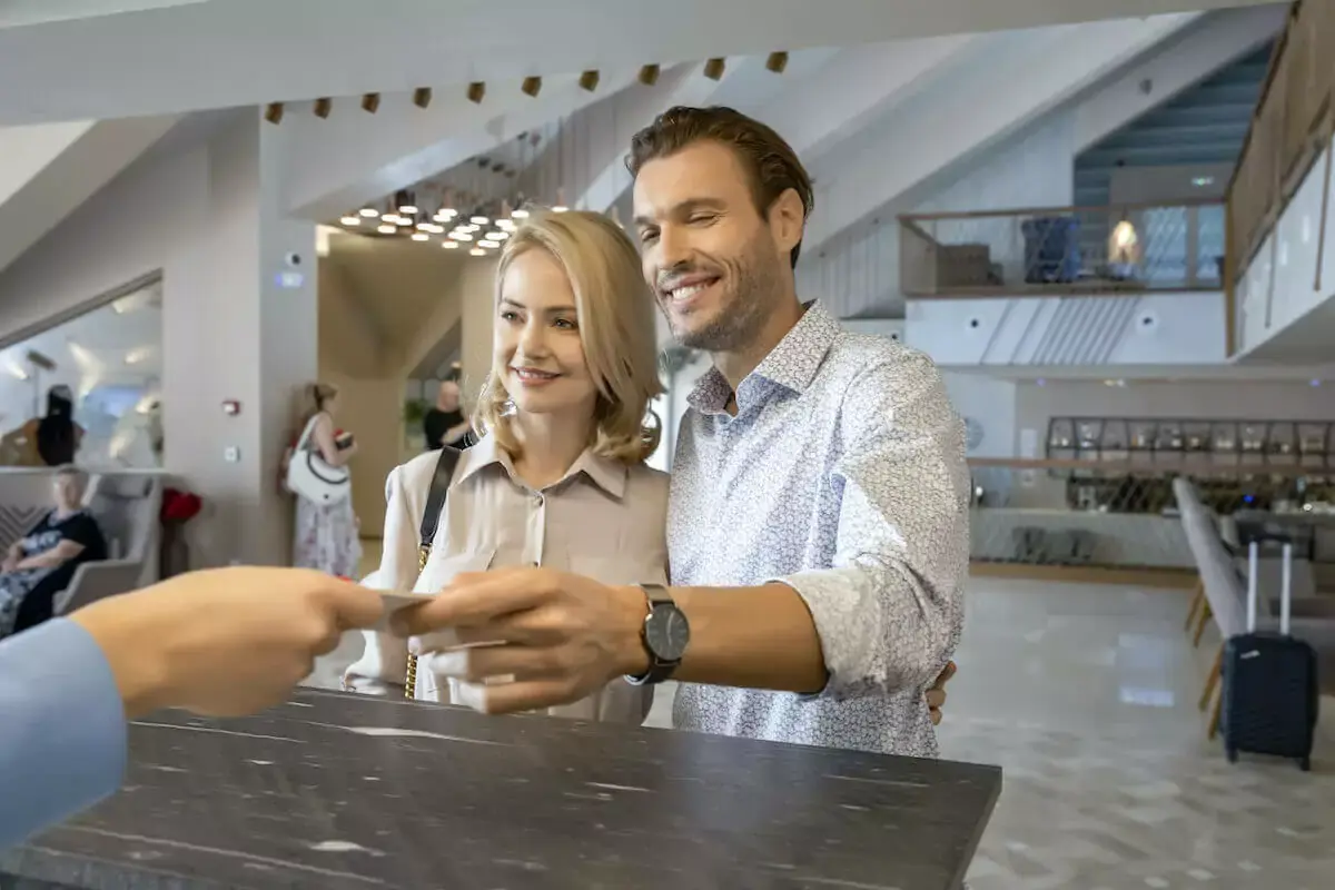 couple-checking-in-a-hotel.jpeg