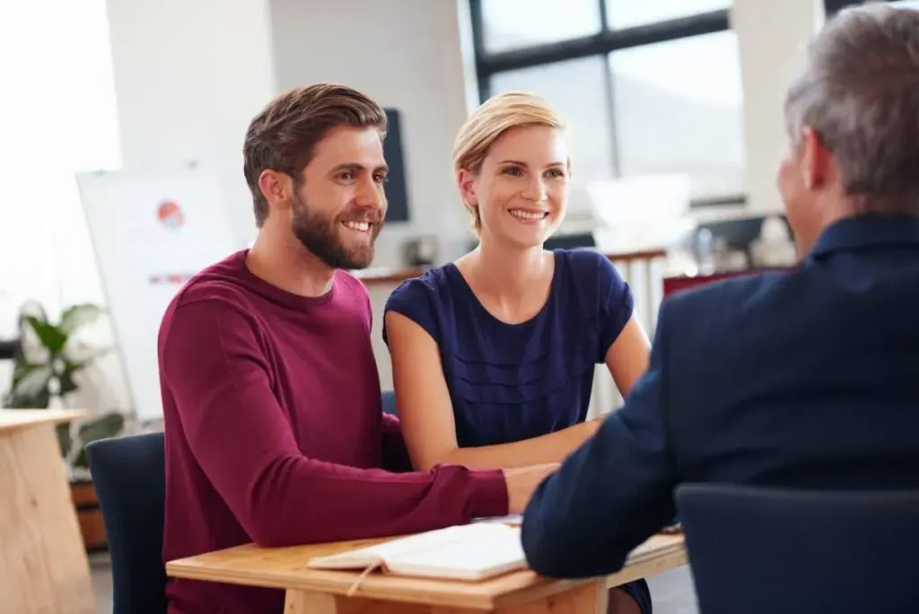 couple-talking-to-a-financial-advisor-1024x684.jpeg