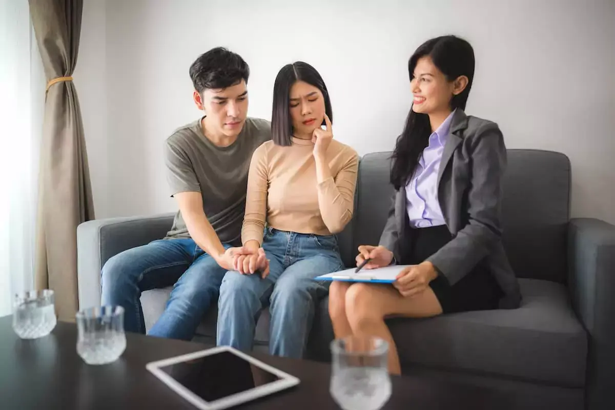 couple-talking-to-a-lawyer.jpeg