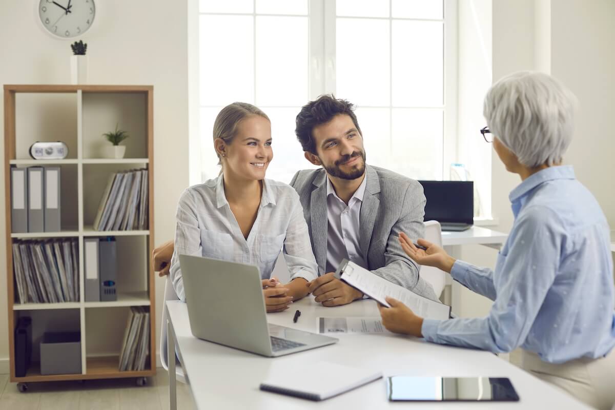 A couple talks with a professional for help