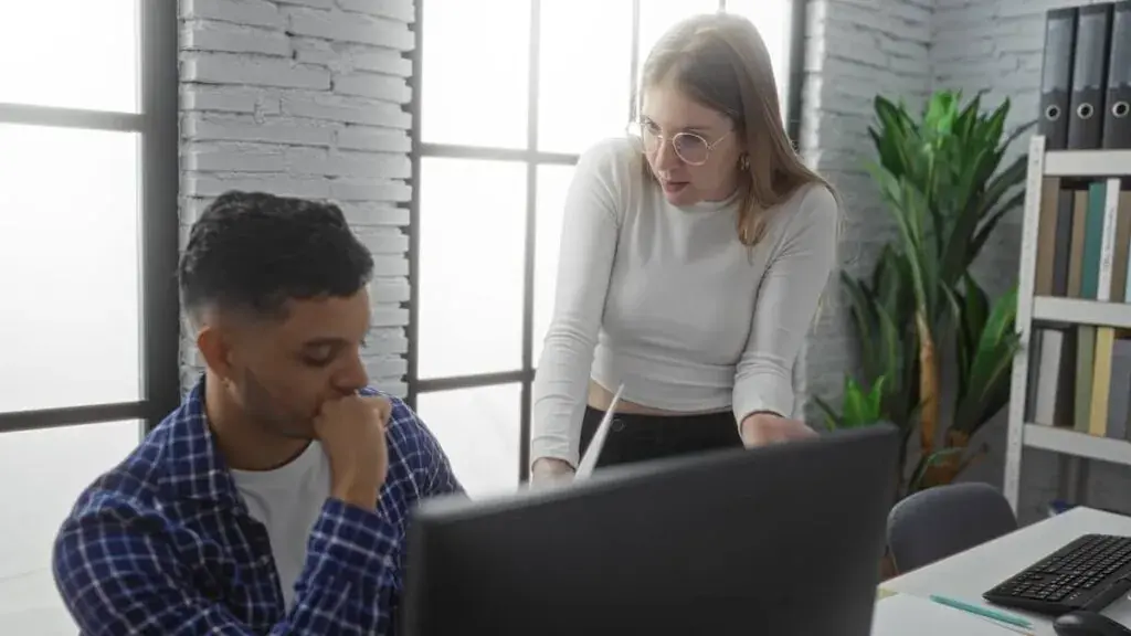 employee-discussing-something-with-her-co-worker-1024x576.jpeg