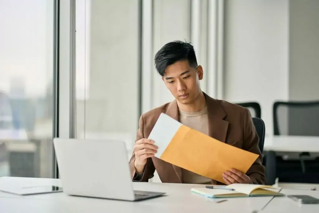 entrepreneur-opening-an-envelope-1024x683.jpeg