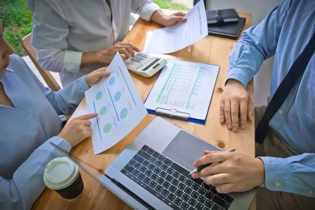 entrepreneurs-analyzing-data-using-a-laptop-and-using-a-calculator-1024x683.jpeg