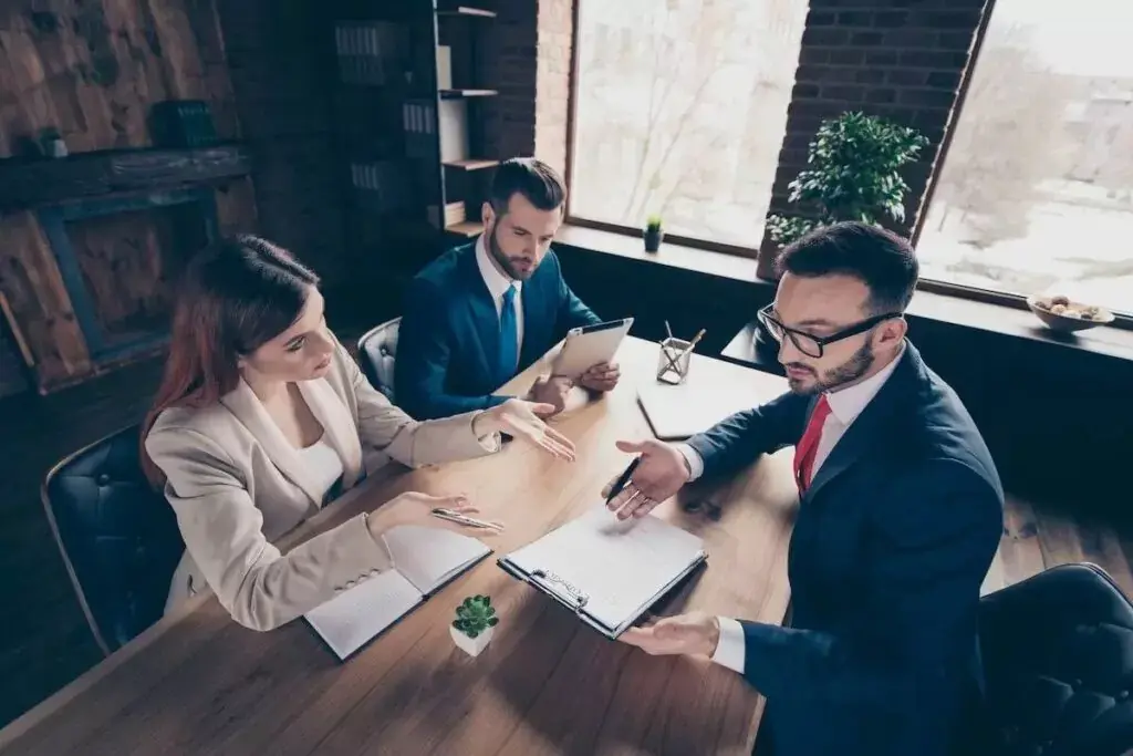 entrepreneurs-discussing-a-contract-at-a-meeting-1024x683.jpeg