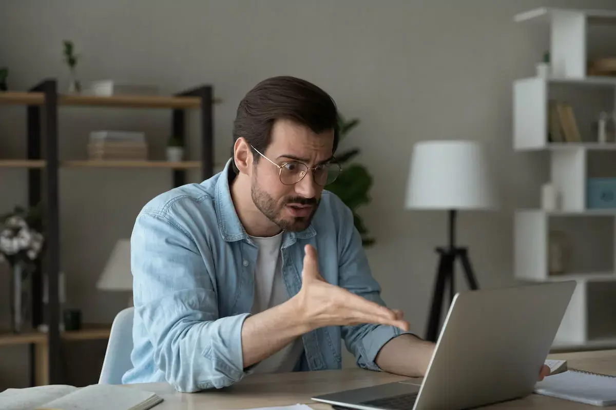 frustrated-man-on-a-video-call.jpeg