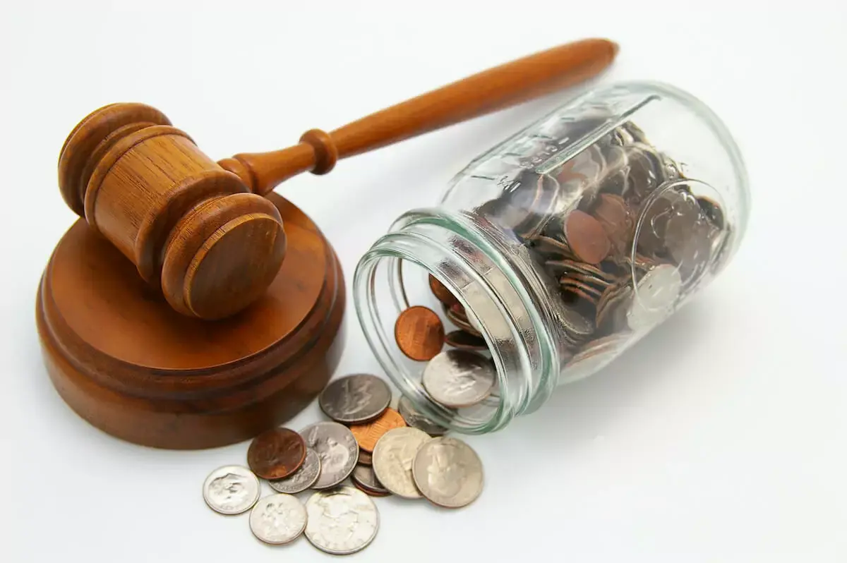 jar-of-coins-and-a-gavel.jpeg