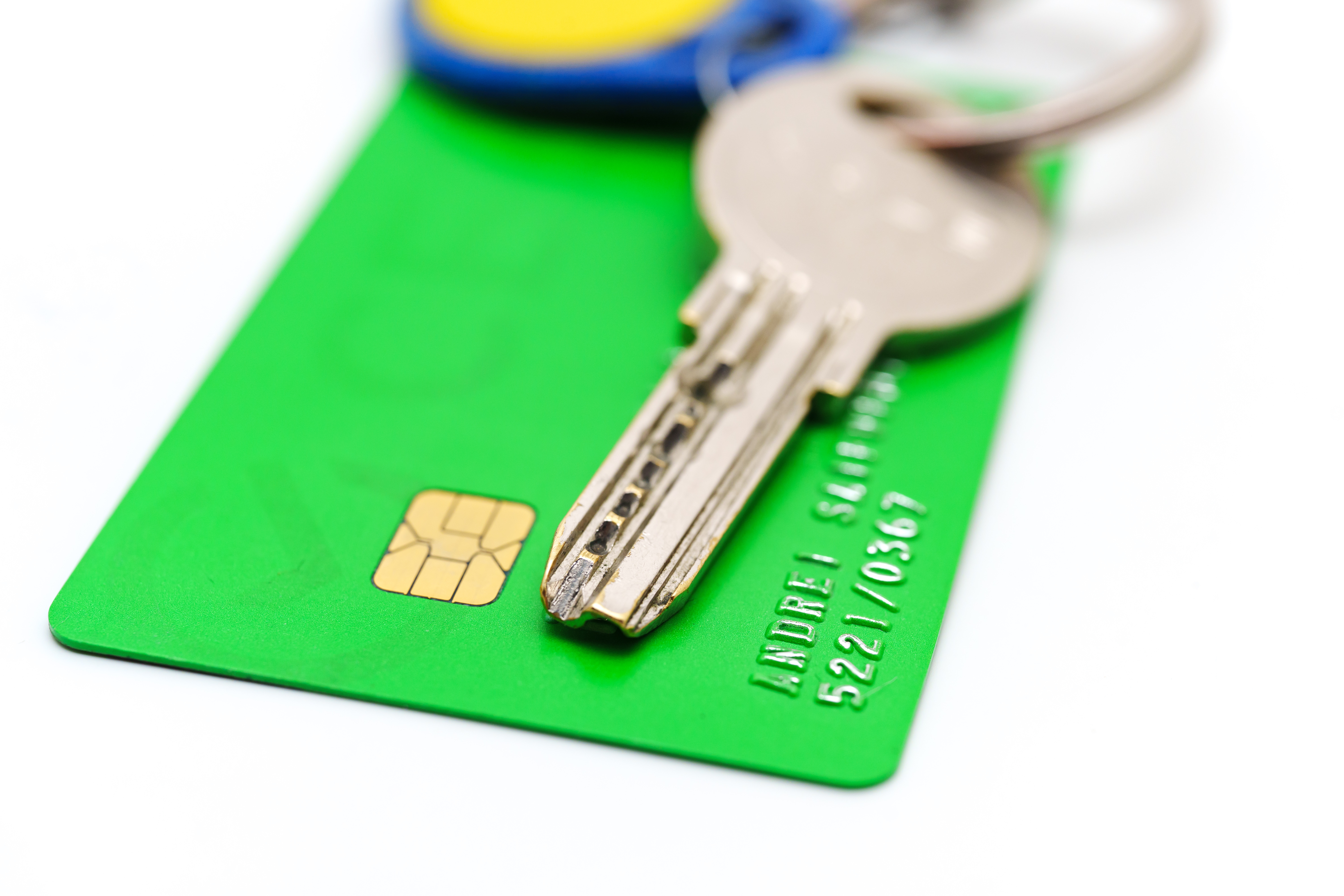 key-on-top-green-credit-card