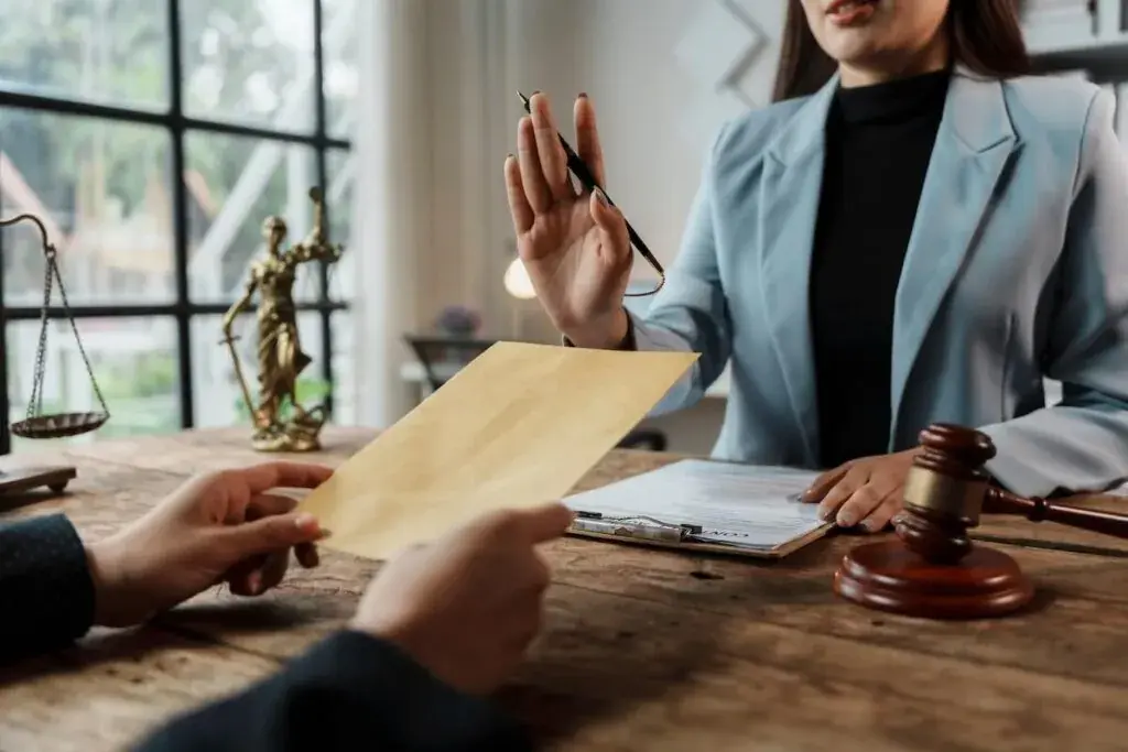 lawyer-refusing-an-envelope-given-by-her-client-1024x683.jpeg