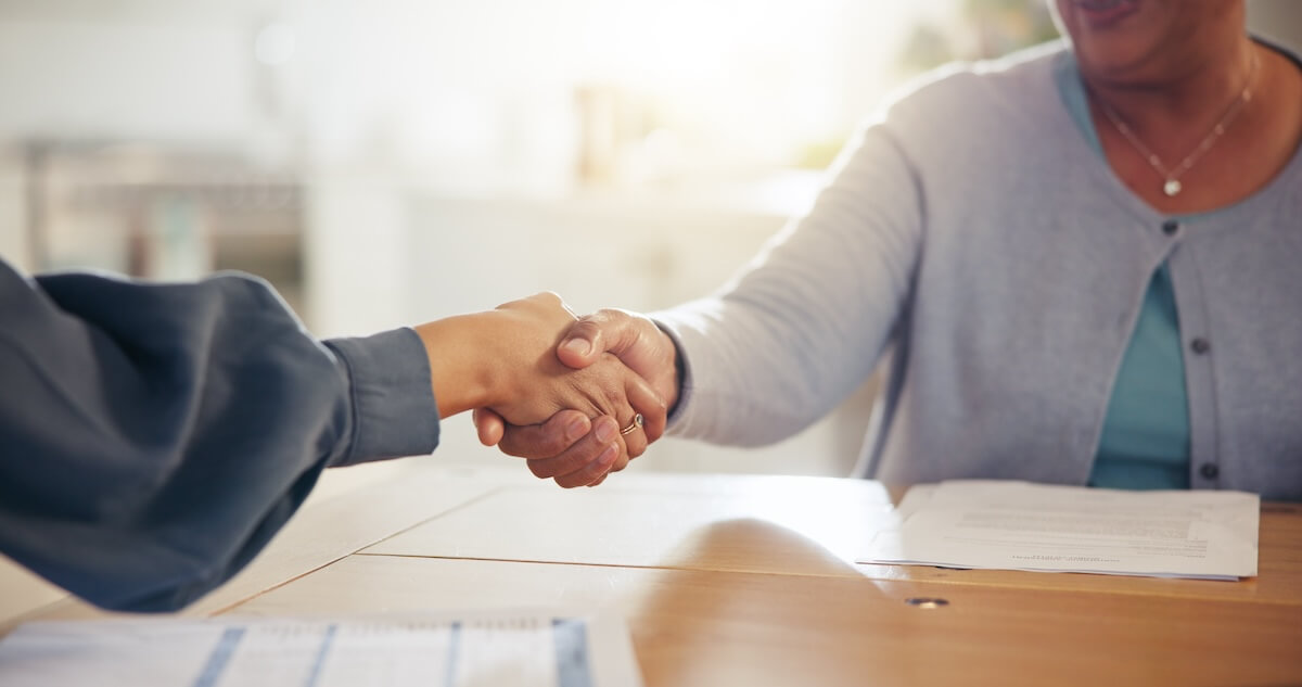 lawyer-shaking-hands-with-a-client