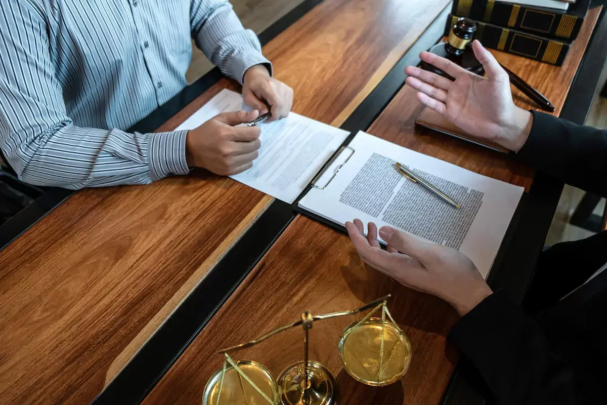 lawyer-talking-to-a-client.jpeg
