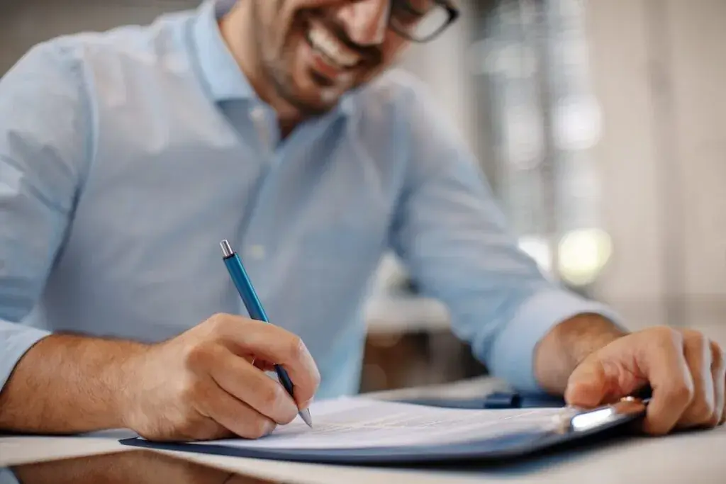 man-signing-a-contract-1024x683.jpeg