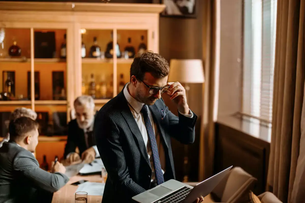 person-reading-something-on-his-laptop.jpg