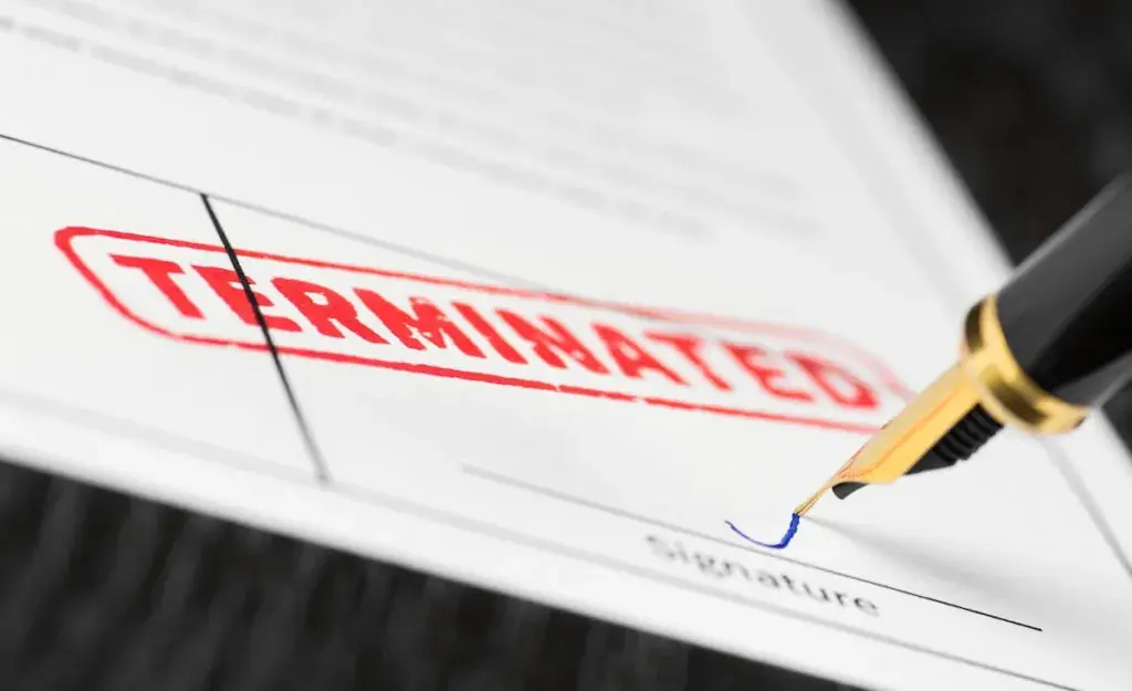 person-signing-a-terminated-document-1024x625.jpeg