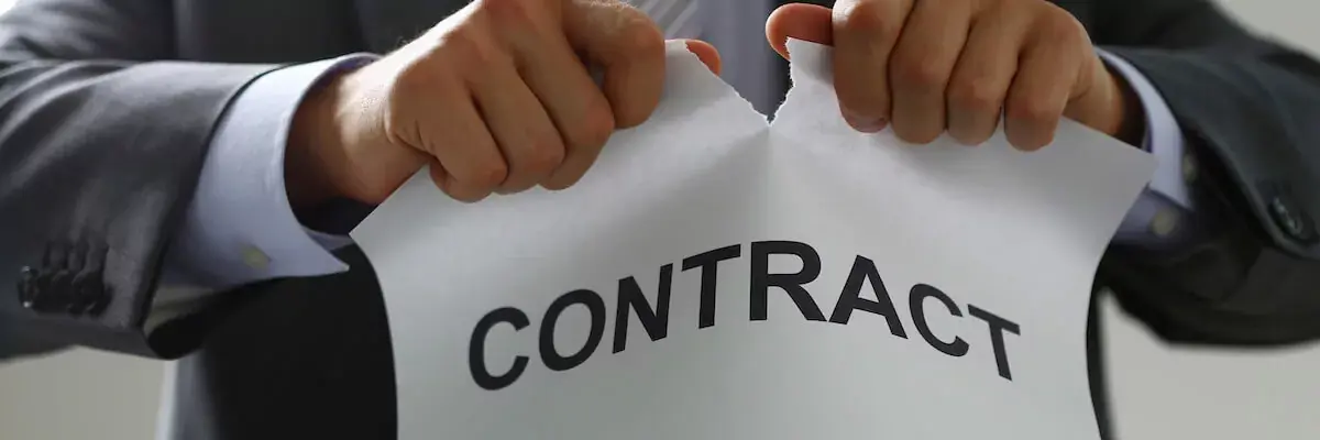 person-tearing-up-a-contract.jpeg