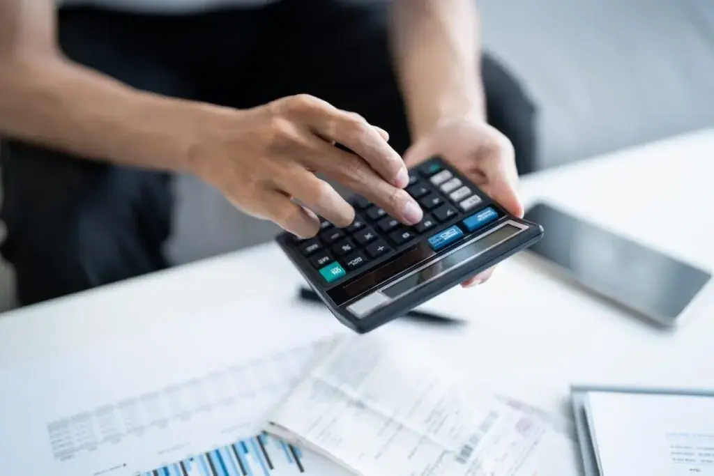 person-using-a-calculator-1024x683.jpeg