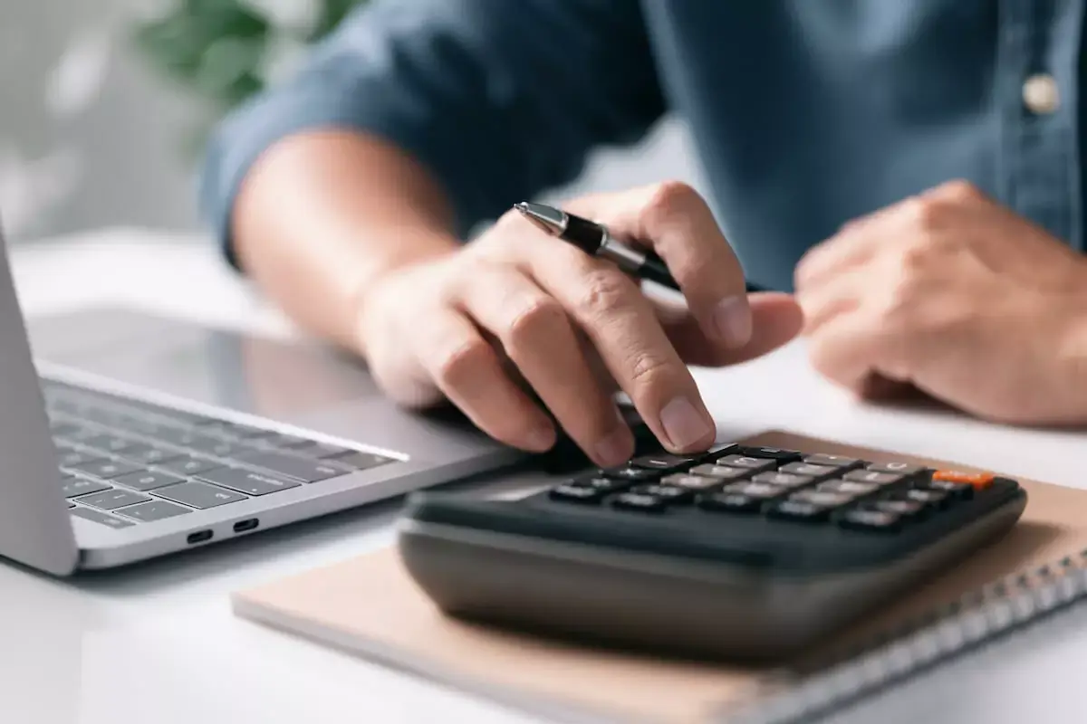 person-using-a-calculator.jpeg (1)