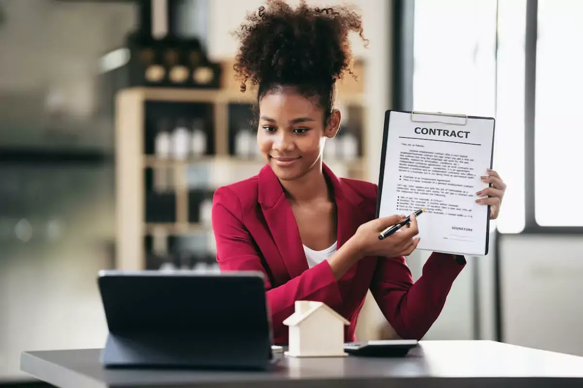 salesperson-showing-a-contract.jpeg