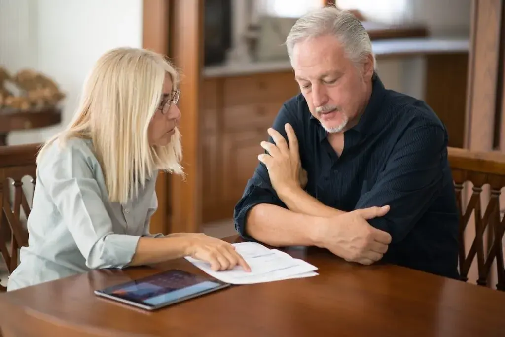 senior-couple-reviewing-documents-together-1024x684.jpeg