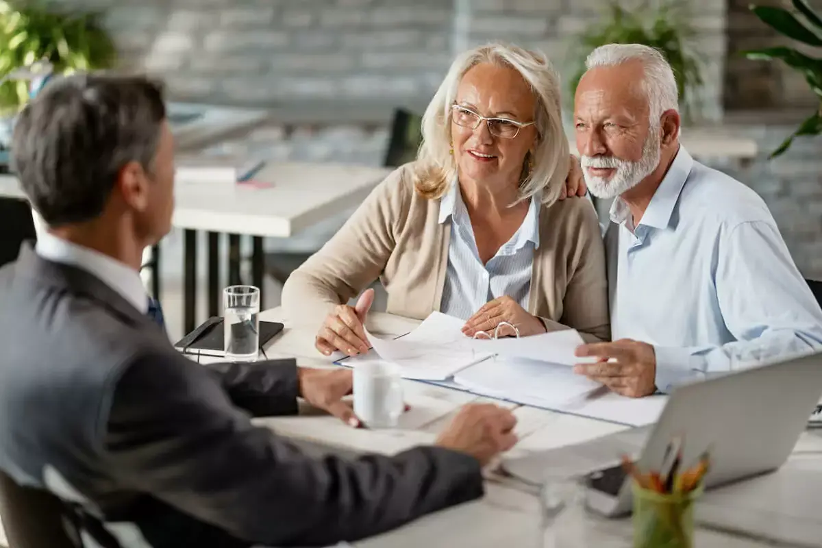 senior-couple-talking-to-an-attorney.jpeg