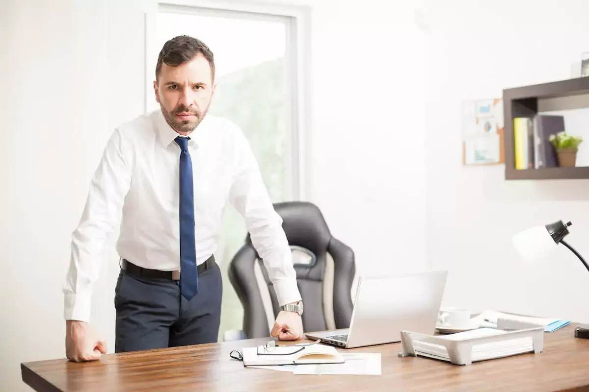 serious-businessman-in-his-office.jpeg