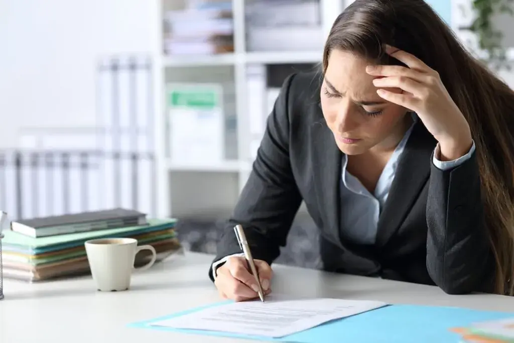 stressed-entrepreneur-signing-a-contract-1024x683.jpeg