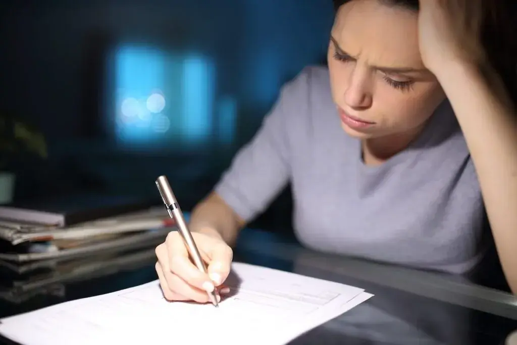 stressed-woman-filling-out-a-form-1024x683.jpeg