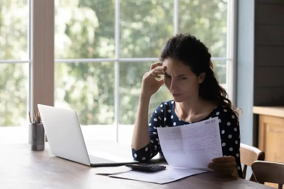 stressed-woman-reading-a-document.jpg