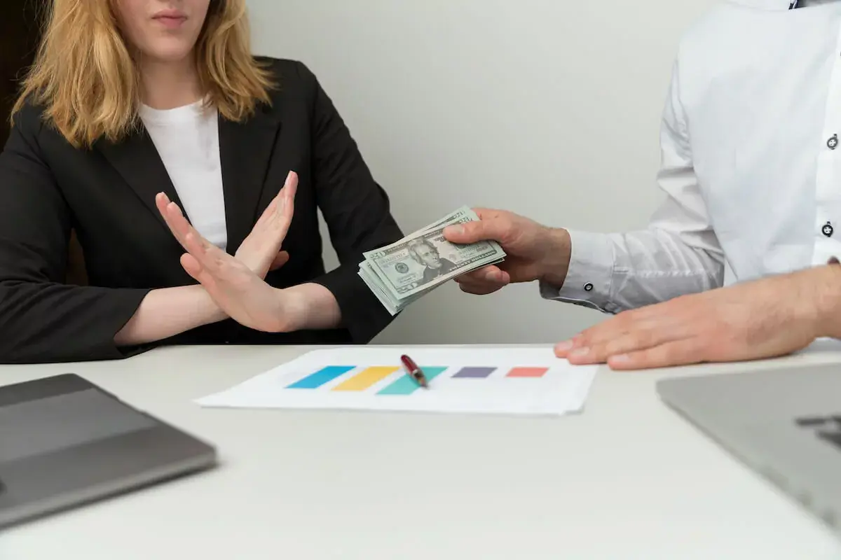 woman-refusing-cash.jpg