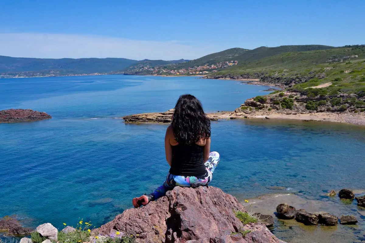 woman-sitting-on-a-cliff.jpg