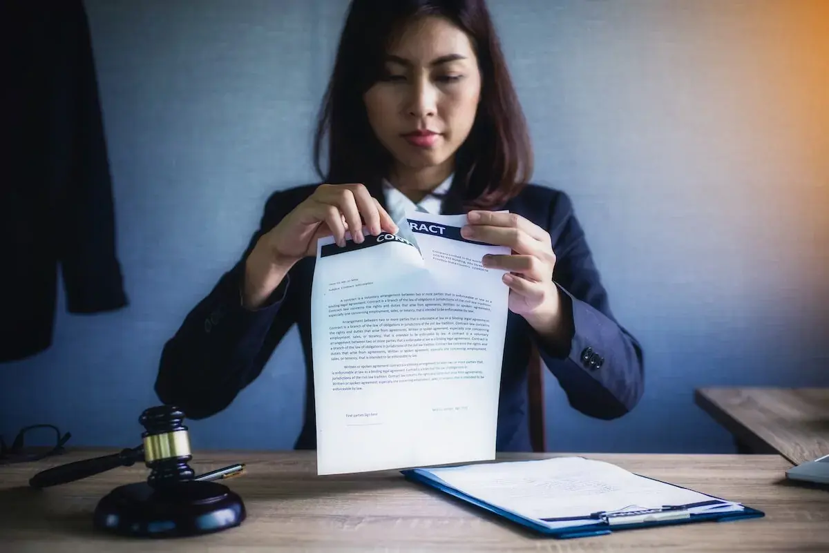 woman-tearing-up-a-contract.jpeg