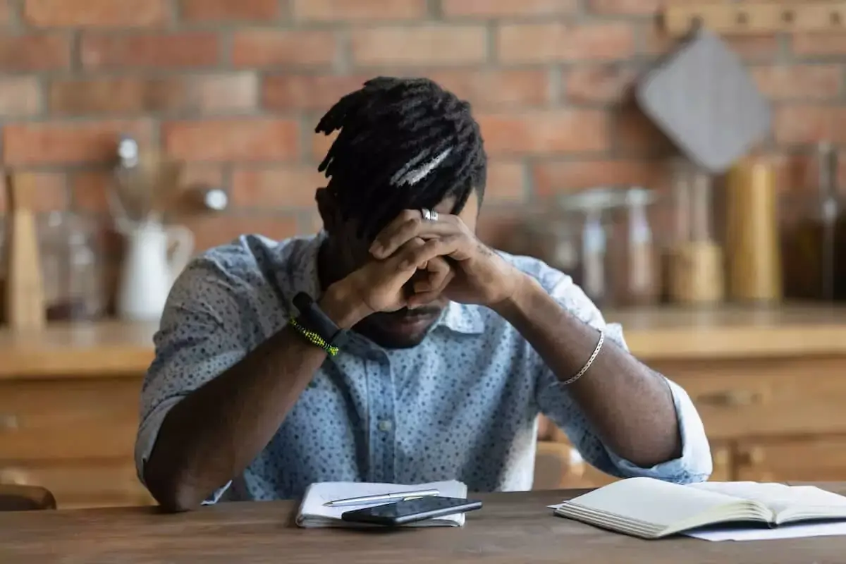 worried-man-with-his-head-down.jpeg