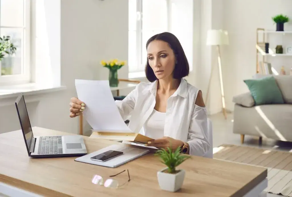 worried-woman-reading-a-document-1024x693.jpeg