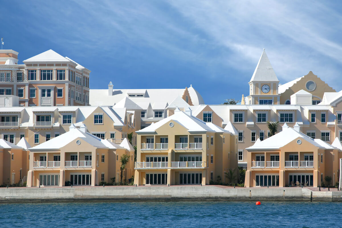 selling timeshares: Bermudian style condominiums along the shore