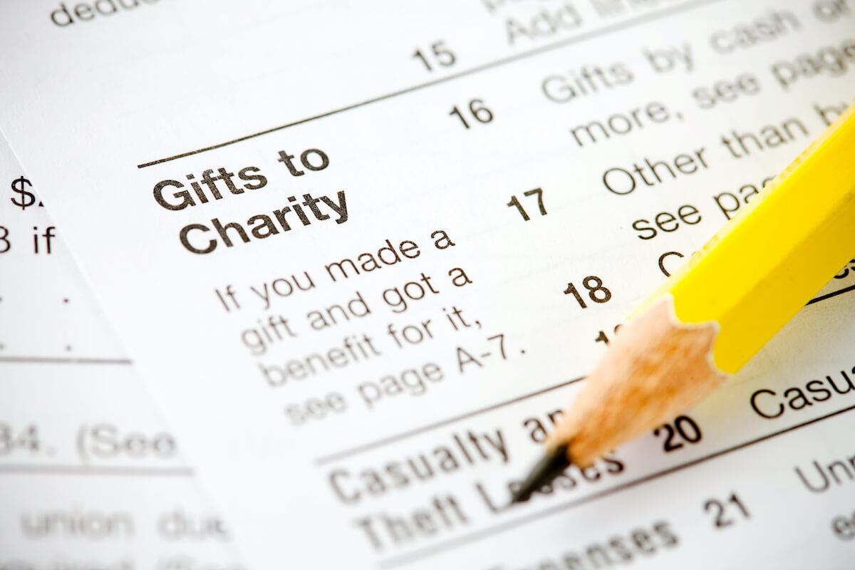 donating timeshares: Close up shot of the charitable contribution deduction section of an income tax form