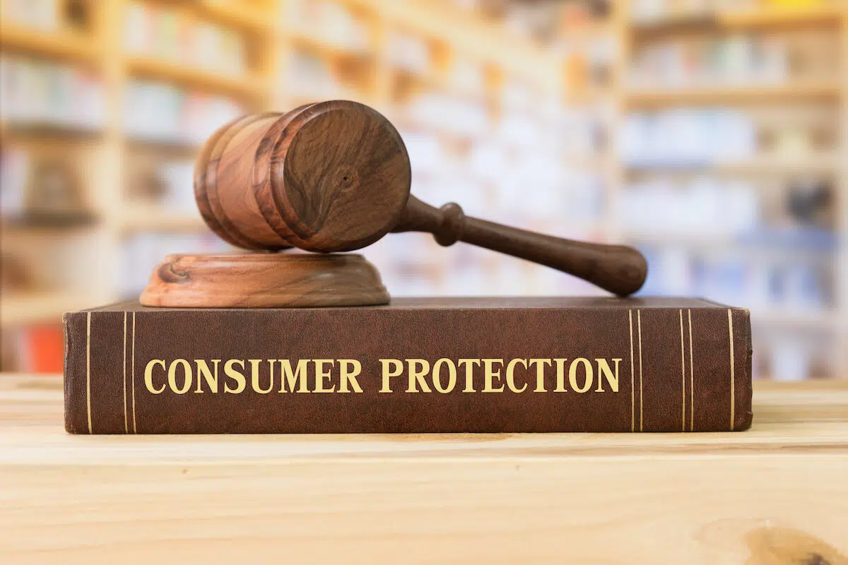 Gavel and hammer on top of a Consumer Protection book