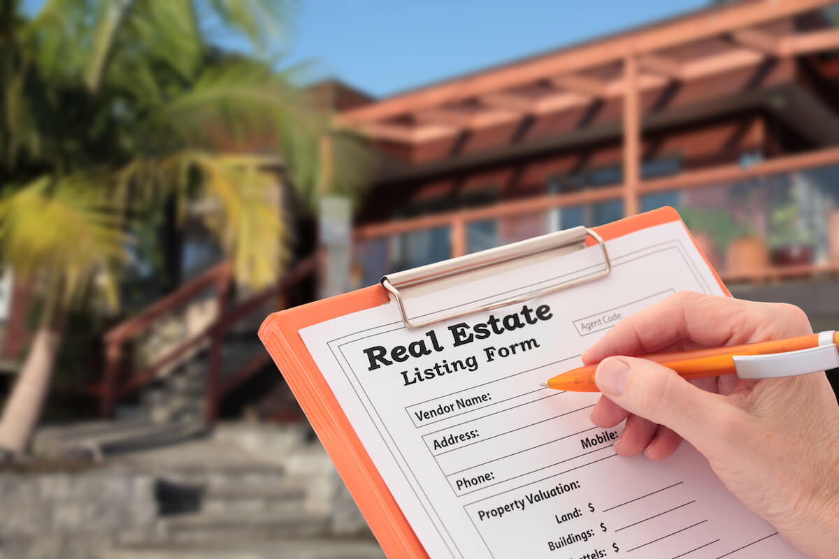 Person filling-out a Real Estate Listing Form