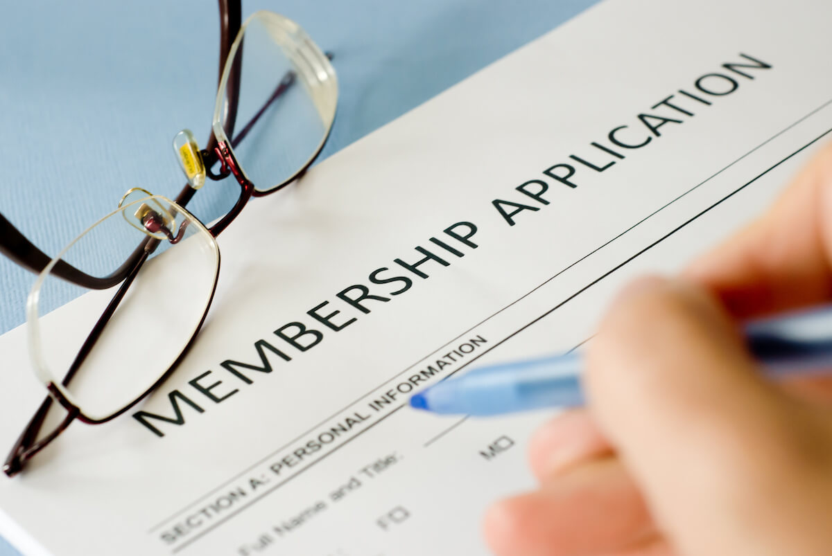 Person filling-out a Membership Application form