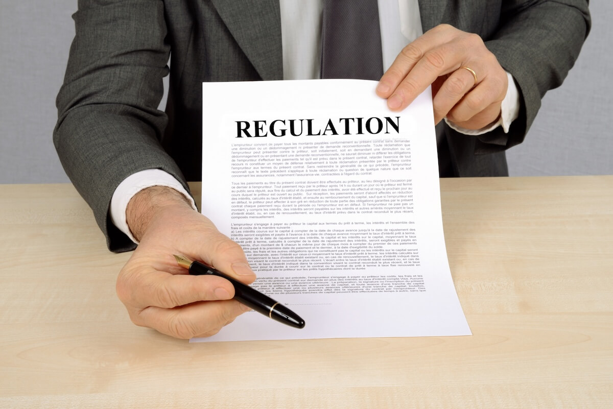 Timeshare regulators: attorney showing a REGULATION document