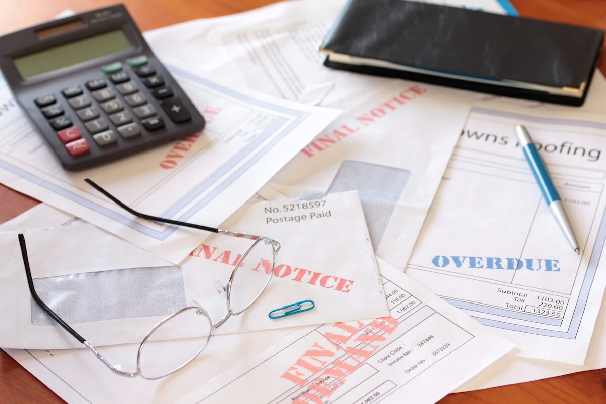 Overdue and unpaid bills on a table