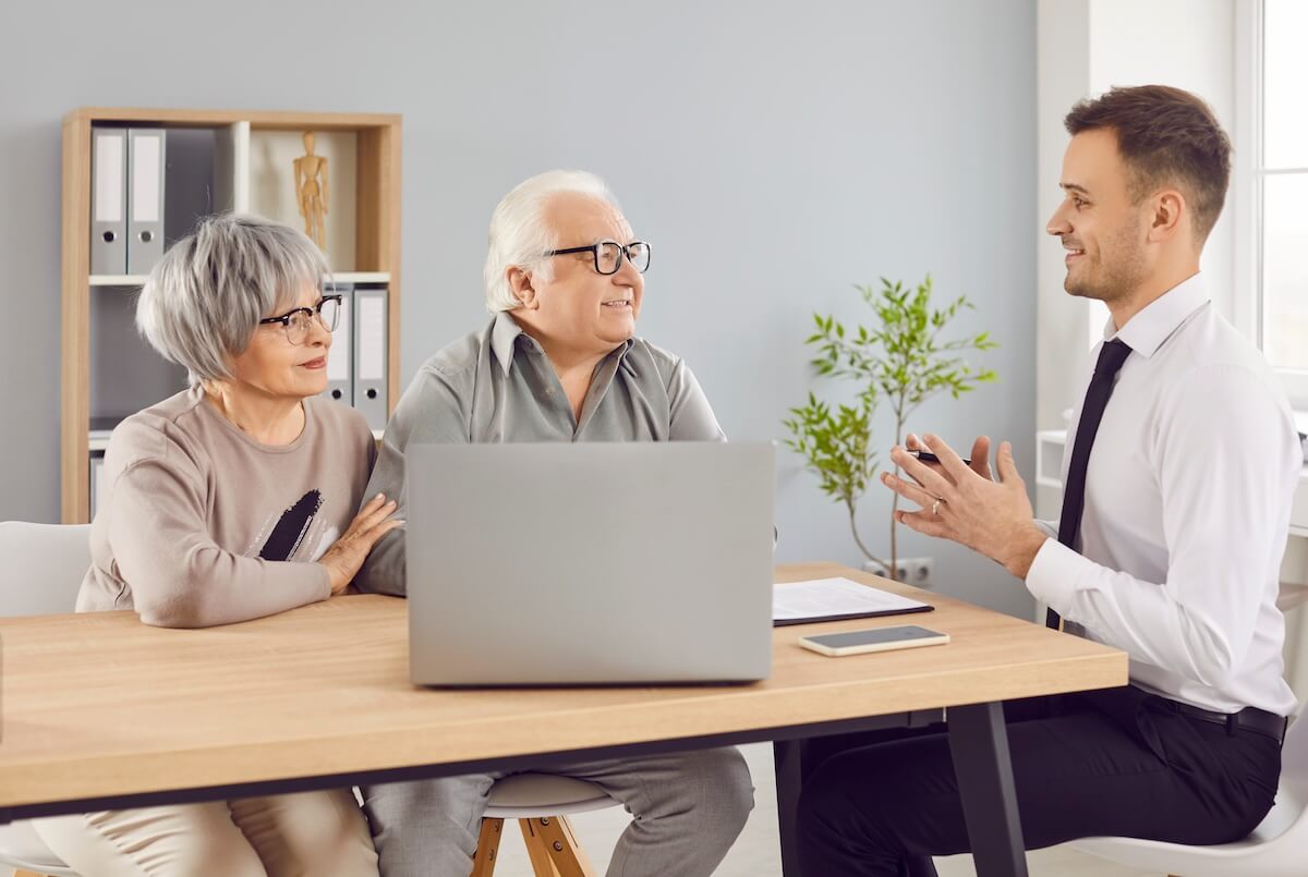 Senior couple talking to a financial advisor