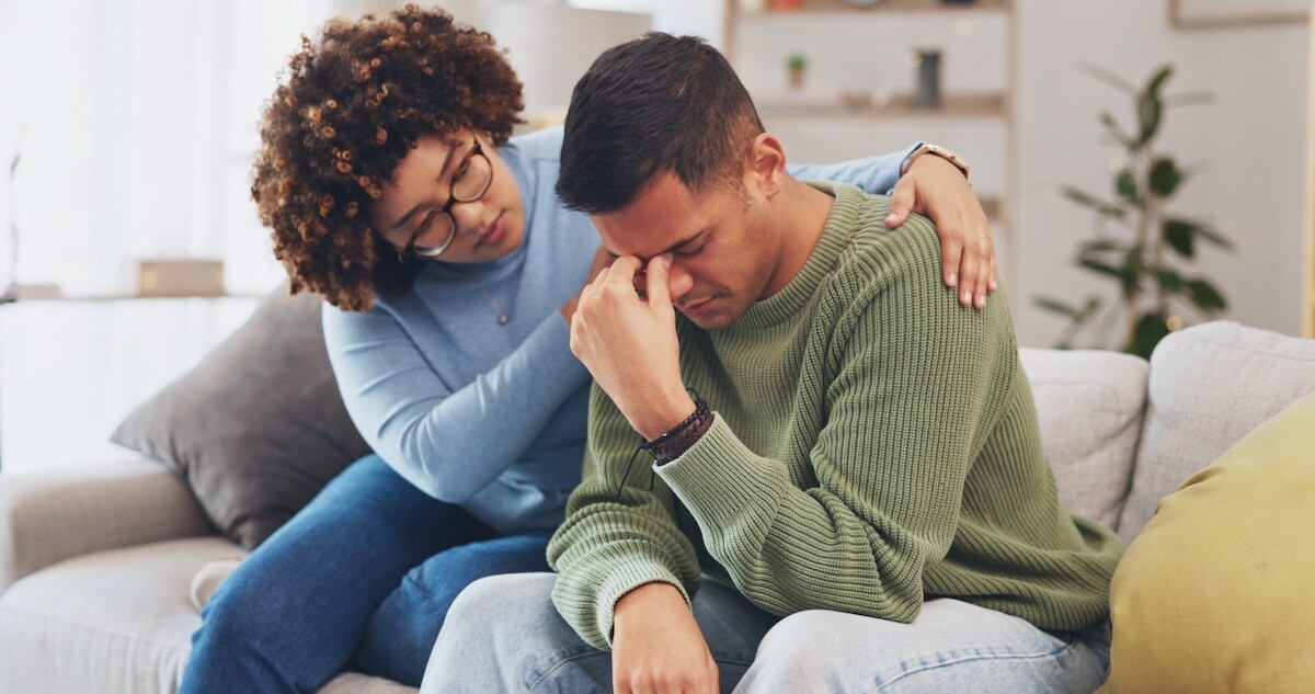 Woman comforting her partner