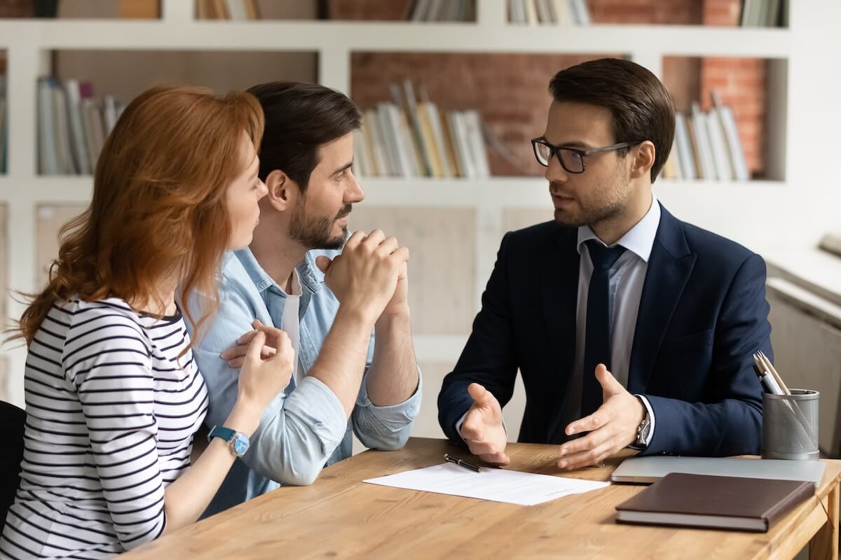 Couple talking to a lawyer