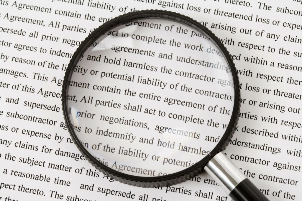 Are timeshare contracts enforceable: magnifying glass on a document