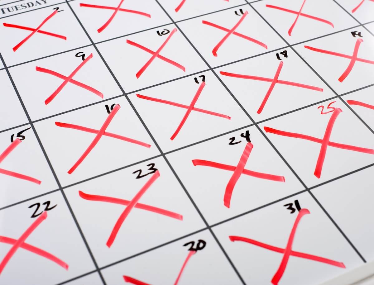 Calendar with red x marks