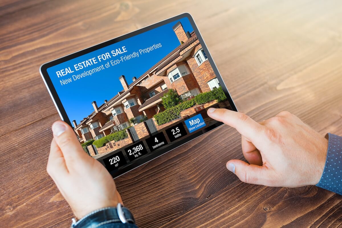 Understanding the Secondary Timeshare Market: Real Estate For Sale shown on a tablet screen